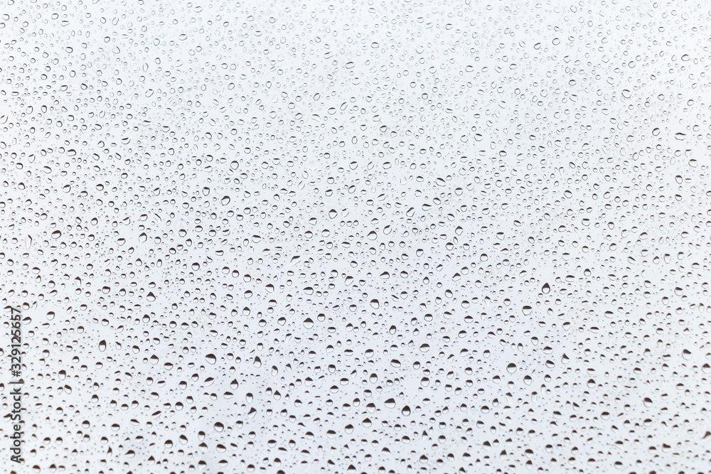 raindrops on glass natural color background. raindrops on glass natural color background.
