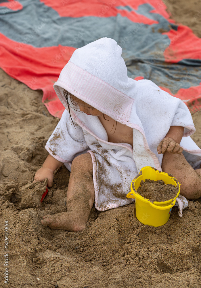 Girl. Beach. Toys. Summer. Towel. Sand. Cute