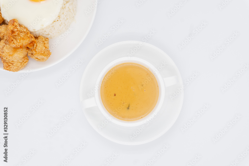 Buttermilk chicken rice with ingredients isolated on white with fried ...