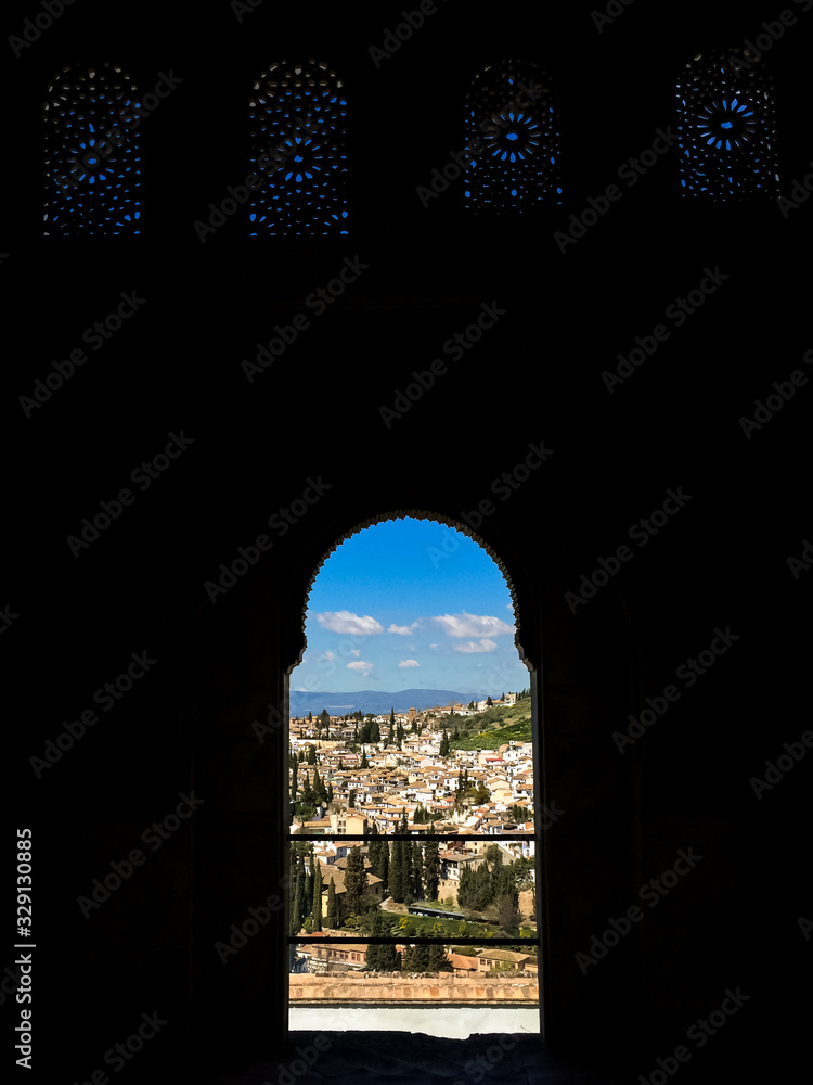 Small Window Overlooking the Cityscape of  Granada, Andalusia / Spain