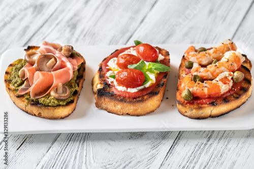 Italian buschettas with different toppings