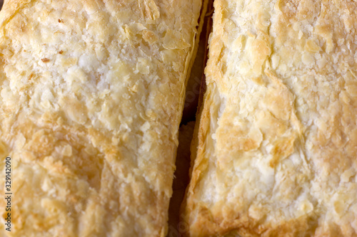 Closeup puff pastry cakes with crispy crust