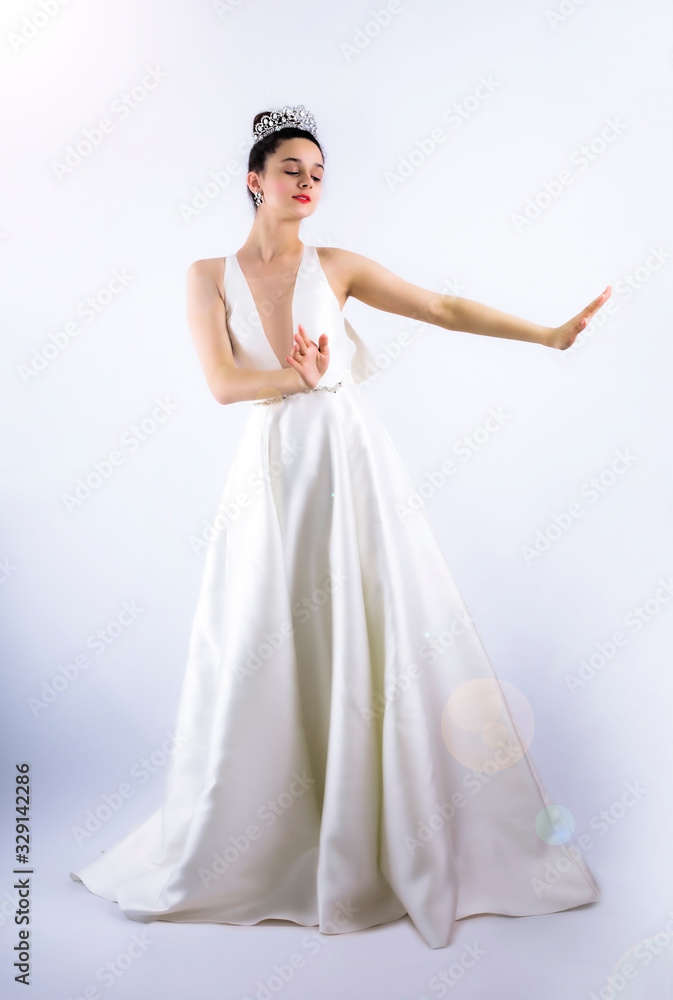 Legible bride gesturing stop with her hand isolated on gray background Legible bride gesturing stop with her hand isolated on gray background