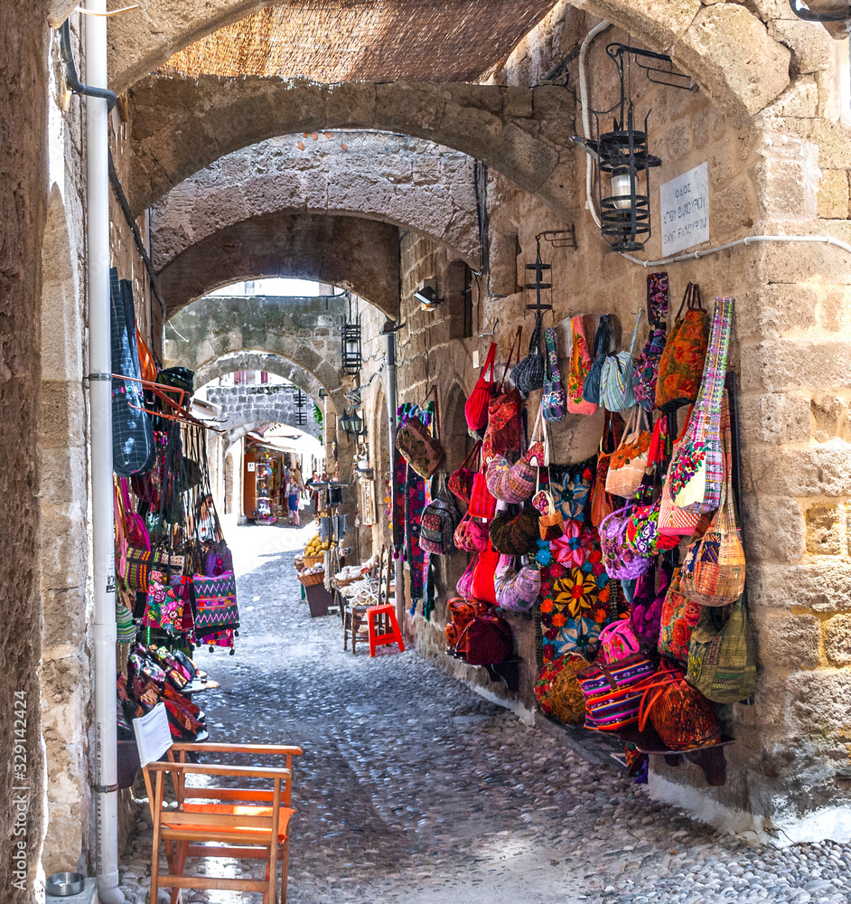 Obraz premium An Intricate network of busy little commercial streets of Rhodes Old Town 