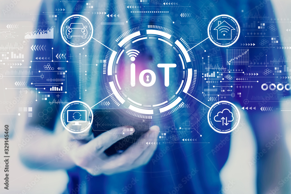 IoT theme with young man using a smartphone IoT theme with young man using a smartphone