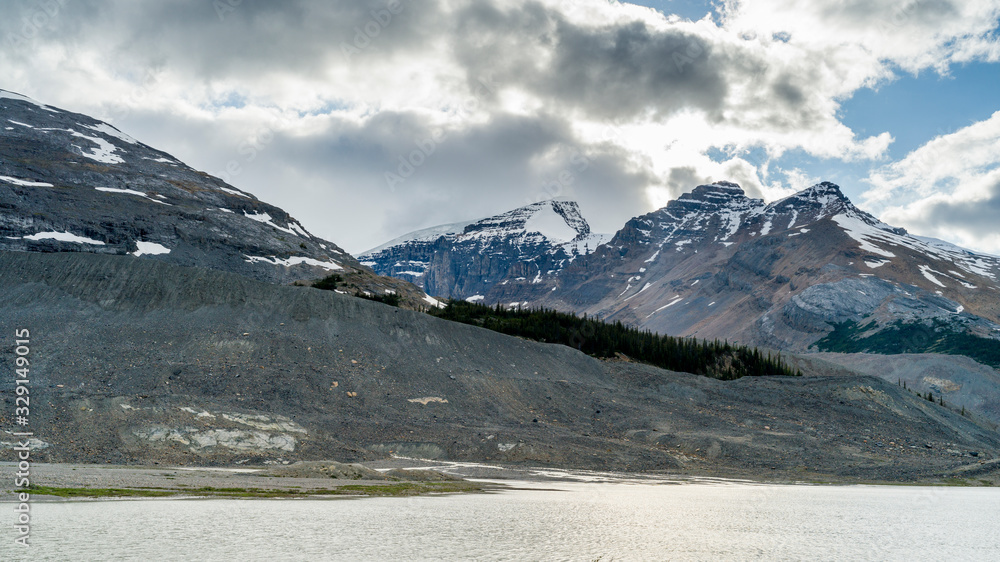 River with mountain range in the background, Icefield Parkway, Alberta, Canada River with mountain range in the background, Icefield Parkway, Alberta, Canada