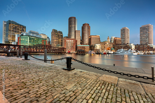 Downtown city view of Boston Massachusetts looking of the riverfront harbor from Fan Pier Park photo