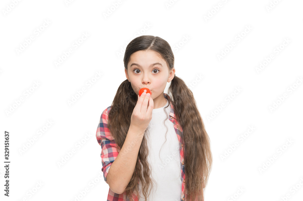 Lips care. Beautiful girl putting on lip balm makeup. Beauty look of adorable small girl. Little child with cute beauty face and long hair. Cosmetics shop. Lipstick moisturising with vitamins and oil