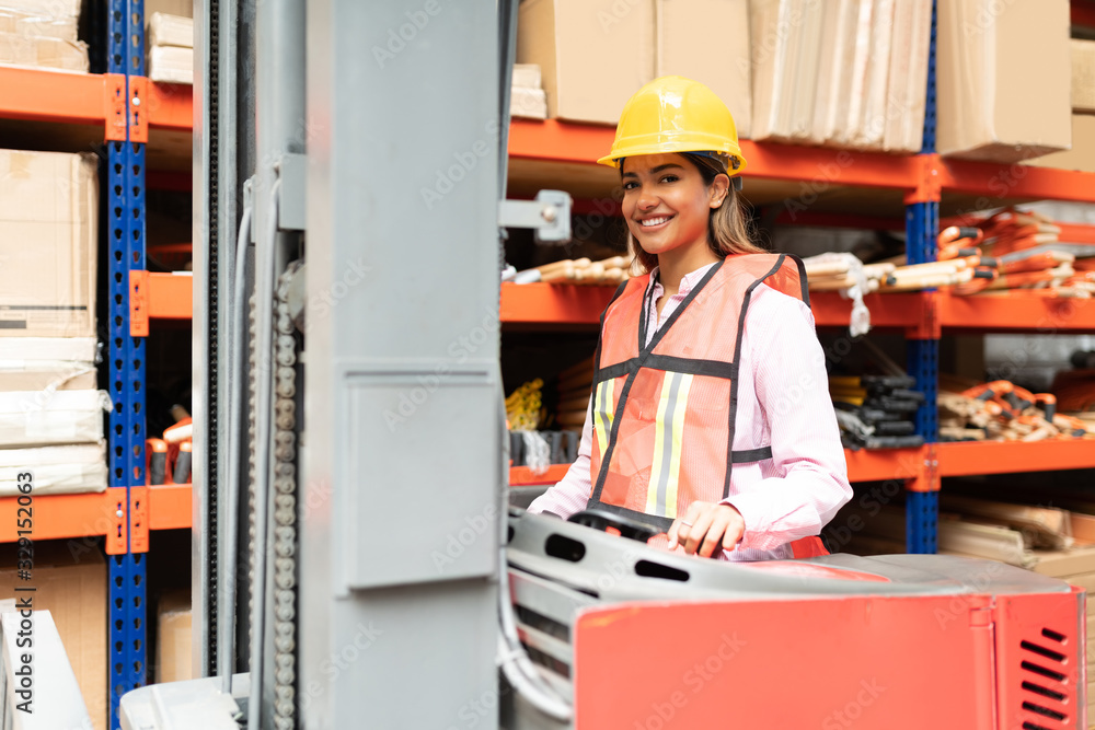 Confident Worker With Machinery At Factory Confident Worker With Machinery At Factory