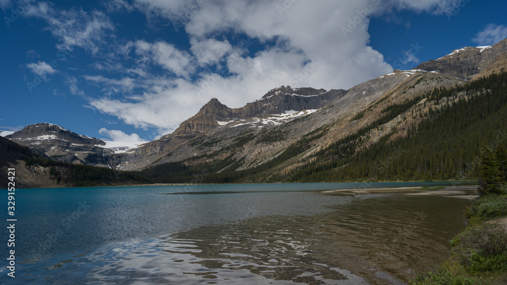 Lake with mountain range in the background, Bow Lake, Banff National Park, Alberta, Canada