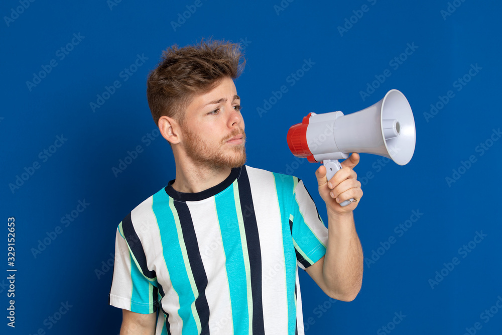 Attractive young guy with a striped T-shirt Attractive young guy with a striped T-shirt
