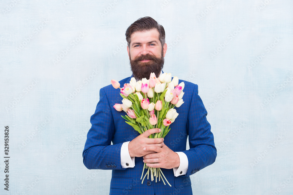 Spring collection. happy man ready for love date. valentines day holiday. spring is here. for my mother at mothers day. happy womans day. celebrate birthday party. confident man hold flowers gift Spring collection. happy man ready for love date. valentines day holiday. spring is here. for my mother at mothers day. happy womans day. celebrate birthday party. confident man hold flowers gift