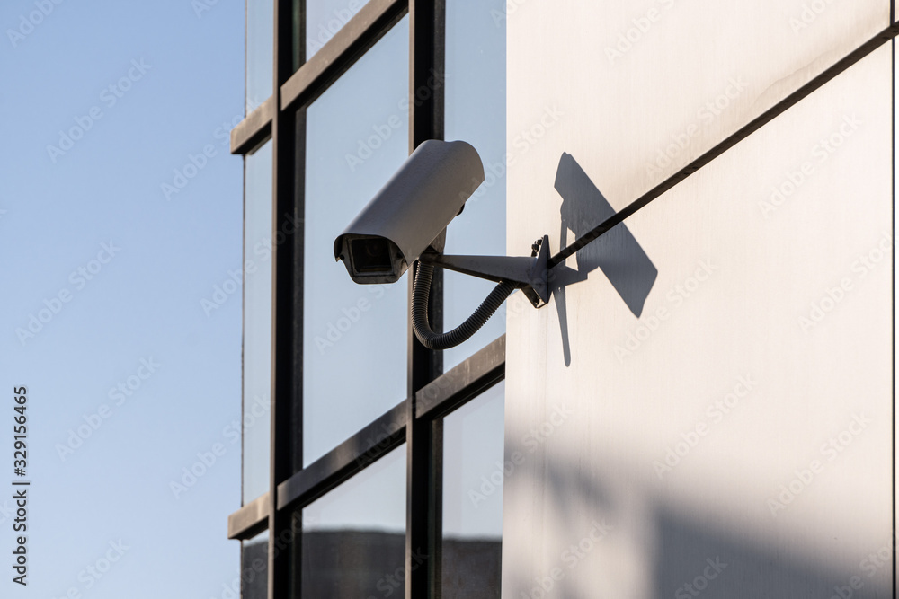 white CCTV cameras on the street, security in the city. covert shooting of what is happening. modern technologies and equipment white CCTV cameras on the street, security in the city. covert shooting of what is happening. modern technologies and equipment