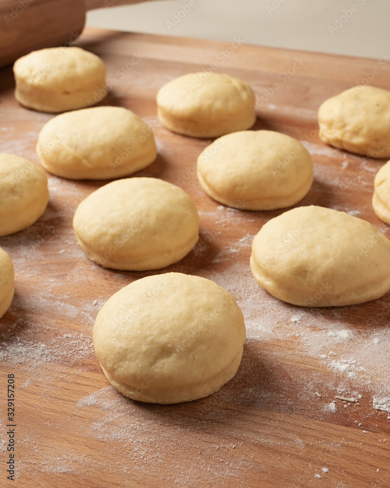 Preparation of doughnuts filled with marmalade from yeast dough