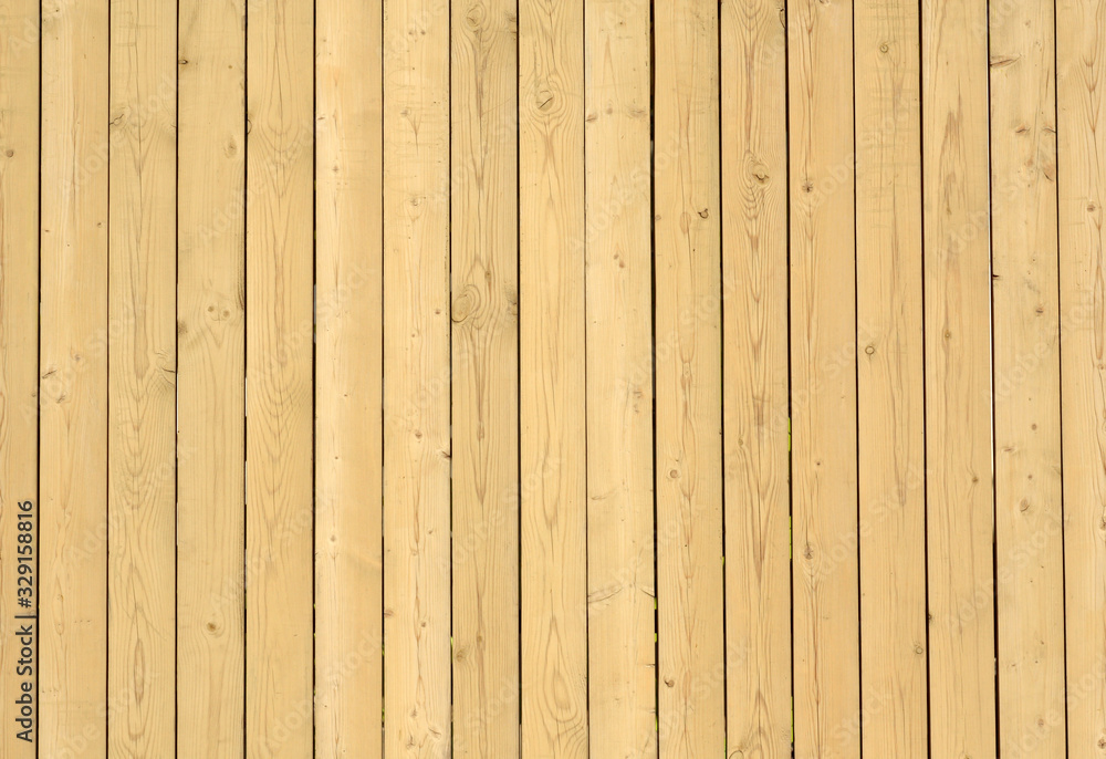 Fototapeta premium Fence made of wooden planks.
