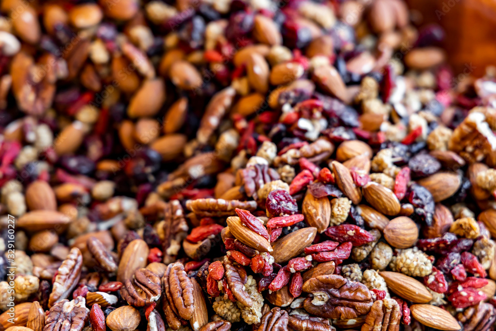 Background from a mixture of dried fruits and nuts. Background from a mixture of dried fruits and nuts.