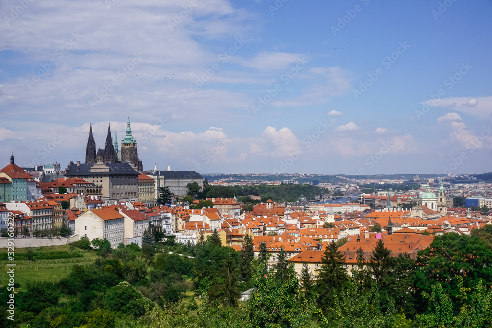 Beautiful panorama of Prague and red roofs of houses