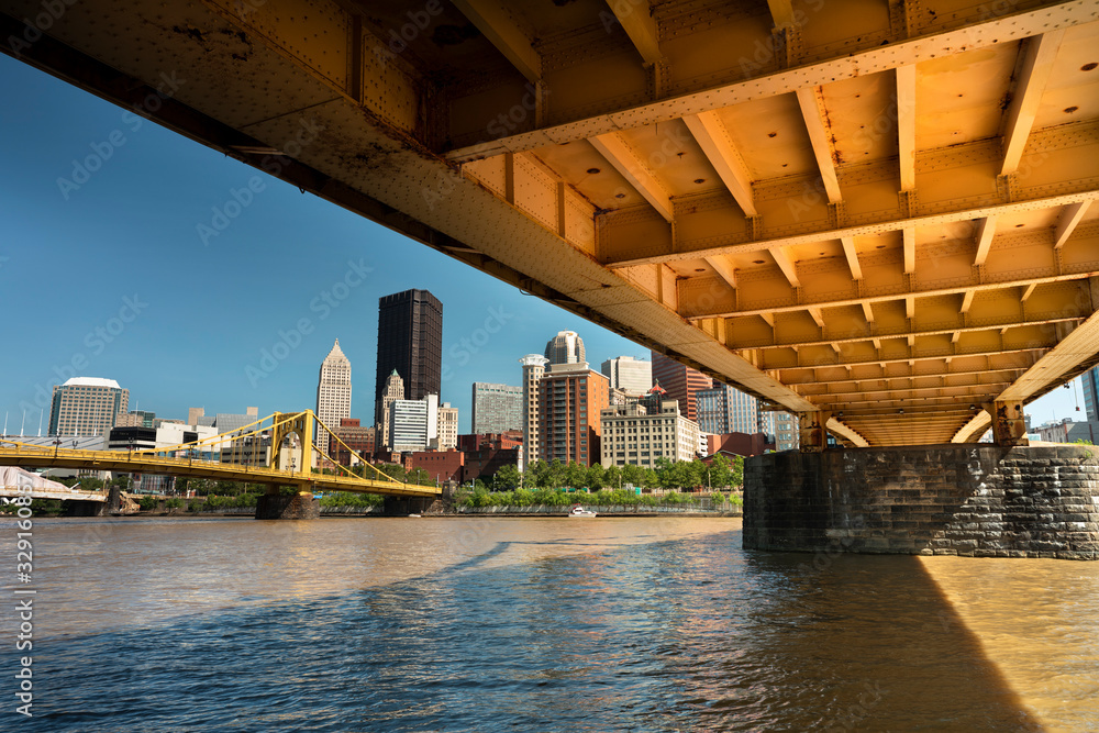 City skyline view over the Allegheny River and Roberto Clemente Bridge in downtown Pittsburgh Pennsylvania USA City skyline view over the Allegheny River and Roberto Clemente Bridge in downtown Pittsburgh Pennsylvania USA