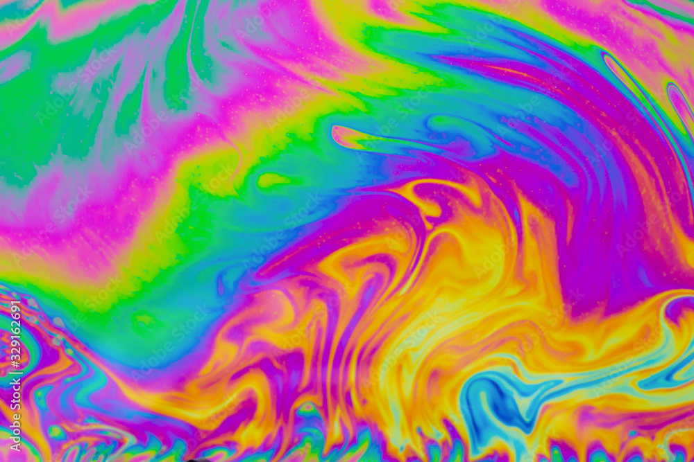 Psychedelic multicolored patterns background. Photo macro shot of soap bubbles