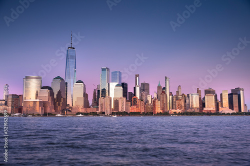 Buildings and skyscrapers of the Manhattan urban skyline over the Hudson river in New York USA © Aevan