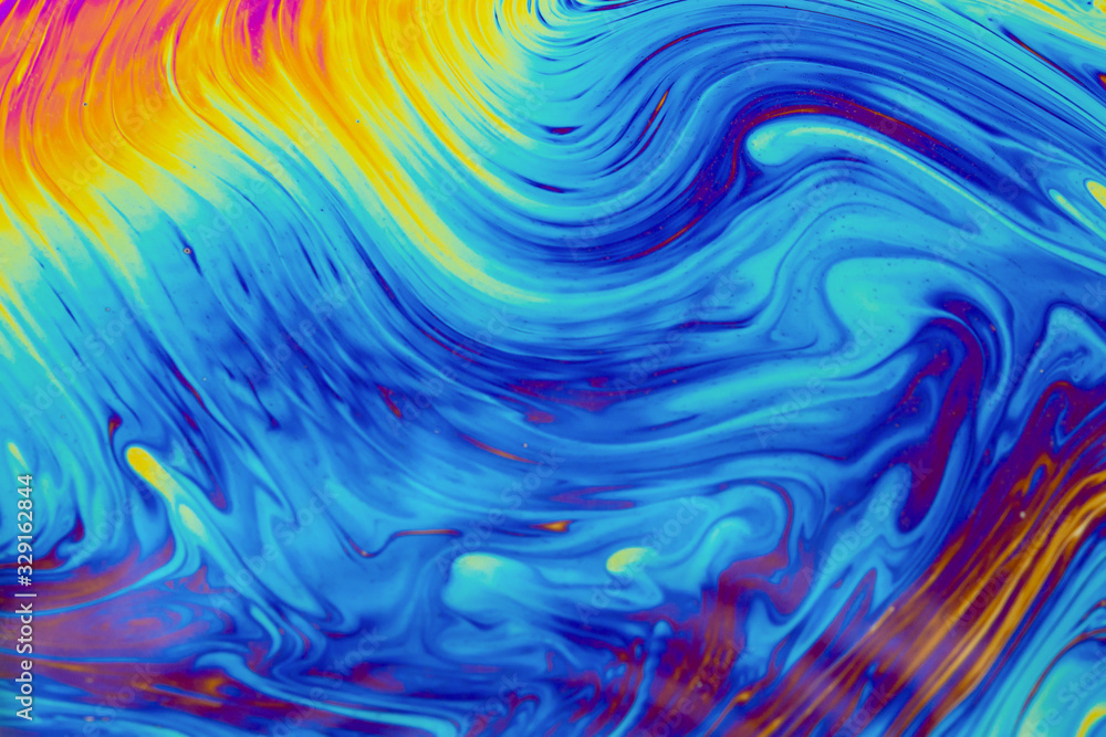 Psychedelic multicolored patterns background. Photo macro shot of soap bubbles Psychedelic multicolored patterns background. Photo macro shot of soap bubbles