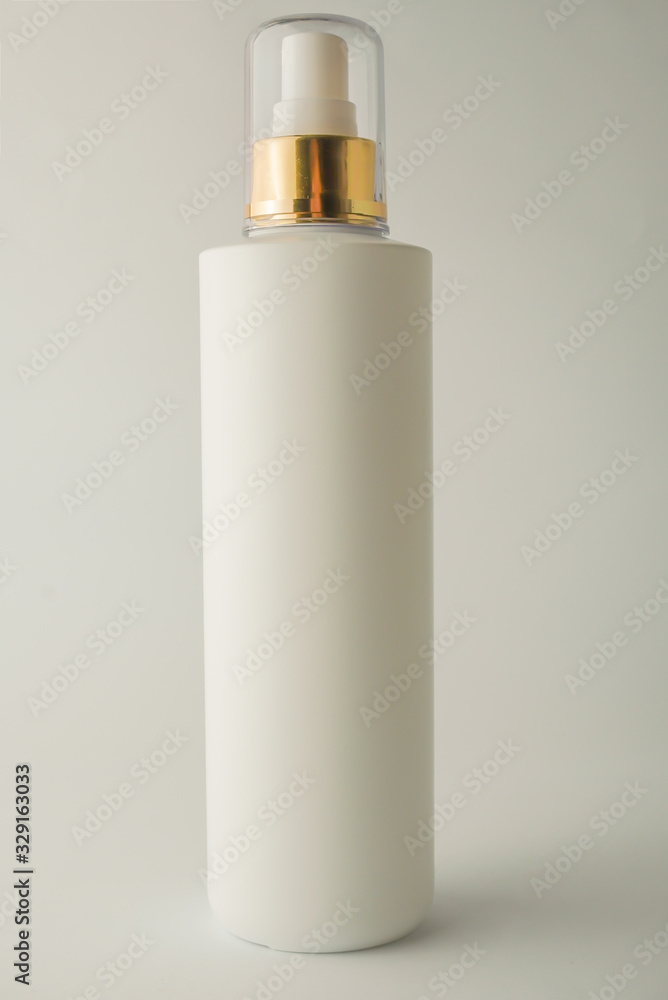 White bottle spray on white background
