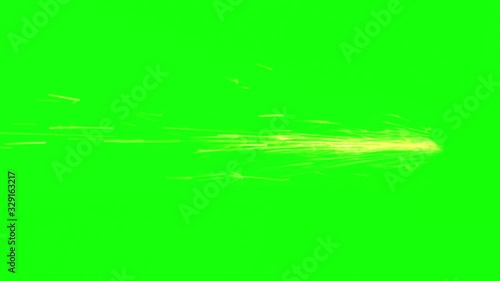 bright sparks fly horizontally from the back point on the green screen
