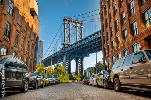 Manhattan Bridge as seen from the DUMBO area of Brooklyn New York USA photo