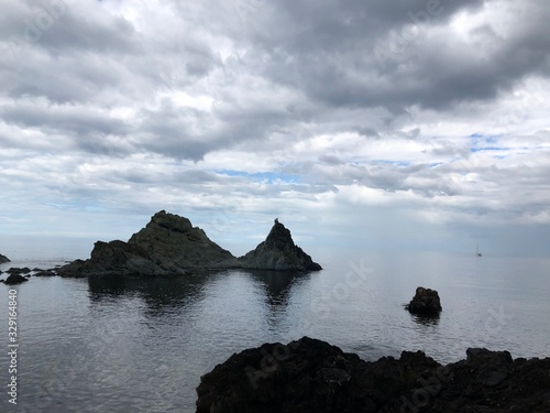 Jagged rocks in the North Sea; Portsoy, Scotland photo