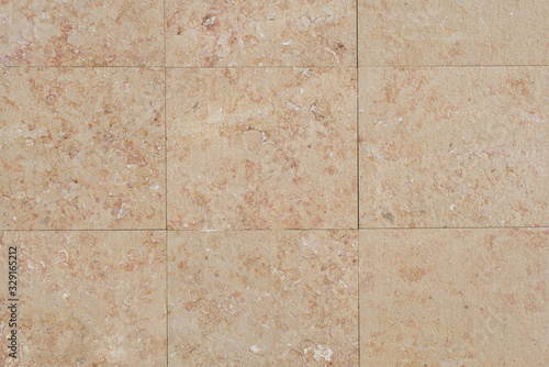 Orange wall stained with slabs