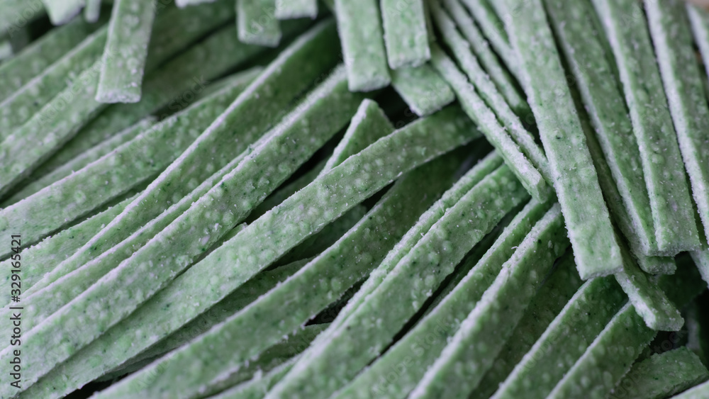 Fototapeta premium green healthy egg noodles close-up