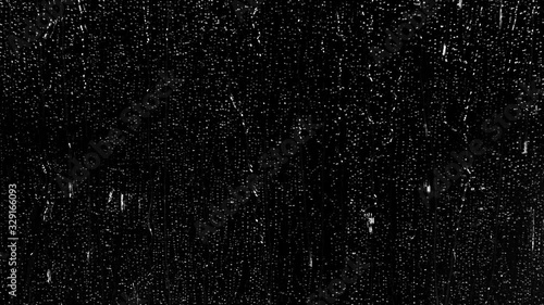 Rain water droplets trickling heavily down the window pane on an isolated background