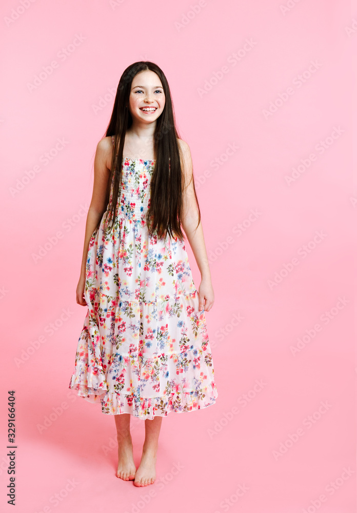 Portrait of adorable smiling little girl child in dress isolated Portrait of adorable smiling little girl child in dress isolated