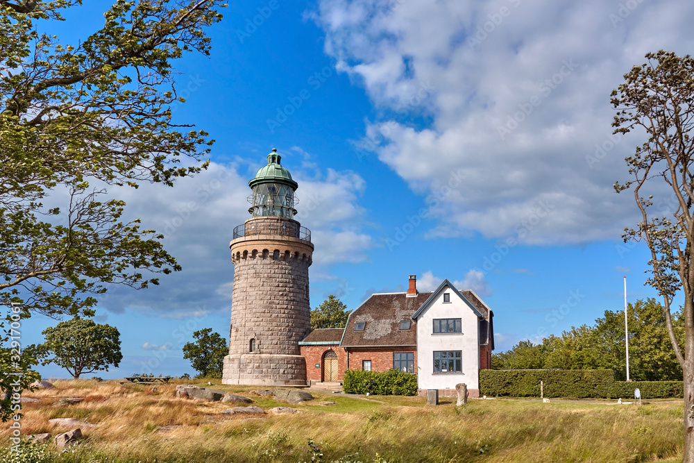 Hammeren Lighthouse (Hammeren Fyr) deactivated in 1990, located on the Hammeren peninsula on the northwestern tip of Bornholm island, Denmark. Hammeren Lighthouse (Hammeren Fyr) deactivated in 1990, located on the Hammeren peninsula on the northwestern tip of Bornholm island, Denmark.
