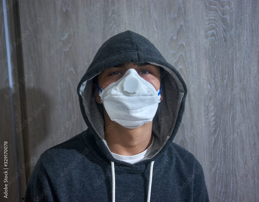 teenager wearing protective mask against corona virus in italy teenager wearing protective mask against corona virus in italy
