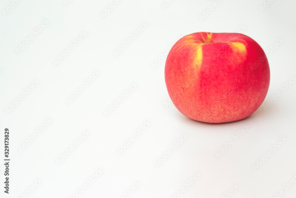 Red apple on white background, close up with copy space Red apple on white background, close up with copy space