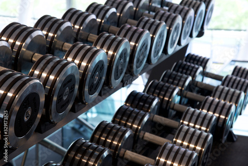Toronto, Ontario / Canada - May 24 2015 : Dumbbell in exercise gyms Studio