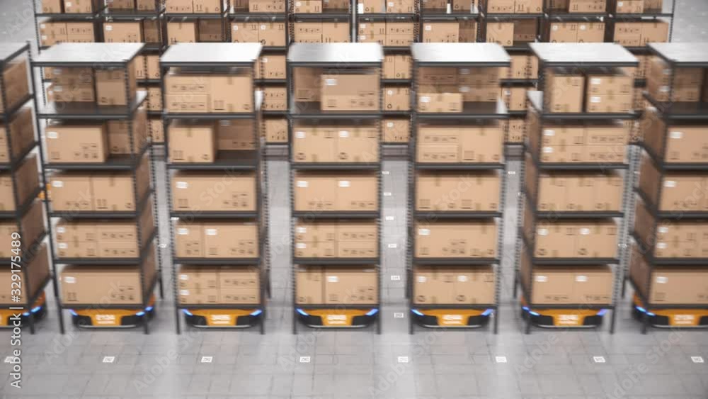 Row of autonomous robots move shelves or racks with cardboard boxes in ...
