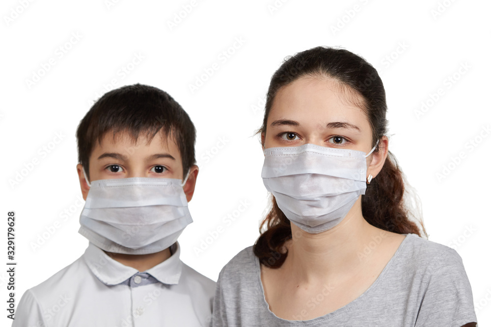 portrait of people in a medical mask a Girl with a medical mask a boy in a mask, to protect against the spread of the virus portrait of people in a medical mask a Girl with a medical mask a boy in a mask, to protect against the spread of the virus