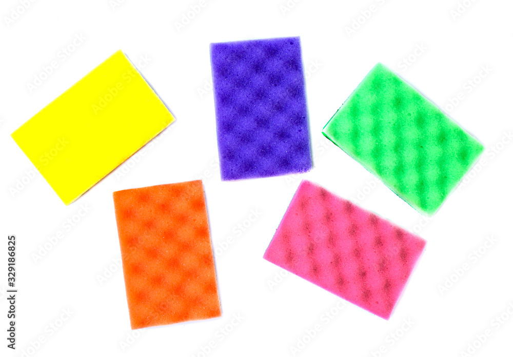 multi-colored sponges on a white background, isolate. multi-colored sponges on a white background, isolate.