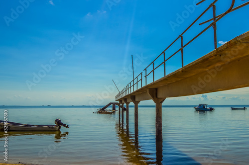 Beautiful bridge and pier at Inhaca or Inyaka Island near Portuguese Island in Maputo Mozambique under blue sky