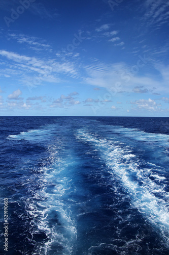 Wake of a ship across the Atlantic Ocean, on a beautiful day. © lisastrachan