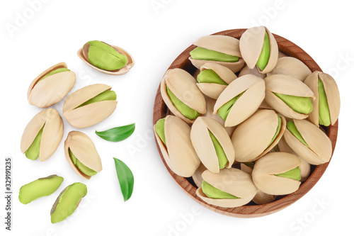 Wallpaper Mural pistachio in wooden bowl isolated on white background with clipping path and full depth of field. Top view. Flat lay Torontodigital.ca