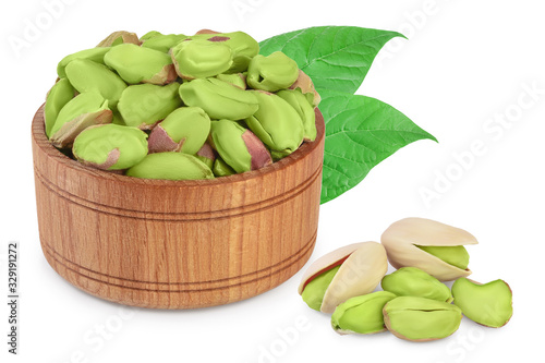 Wallpaper Mural peeled pistachio in wooden bowl isolated on white background with clipping path and full depth of field Torontodigital.ca