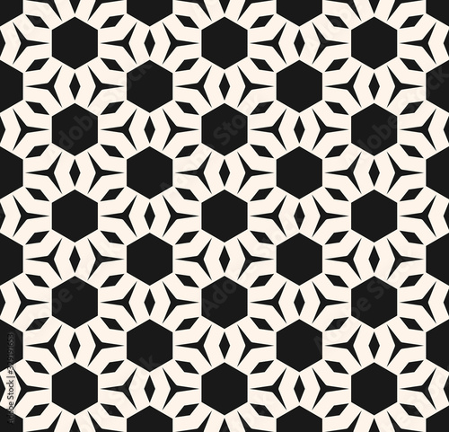 Vector geometric texture. Modern abstract geometrical seamless pattern with simple shapes, hexagons, rhombuses, triangles. Illustration of football ball surface. Abstract monochrome repeat background