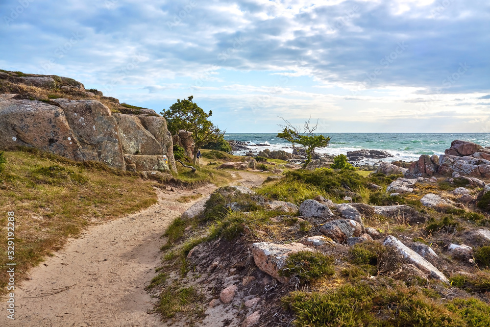 A footpath along Baltic Sea coast on the northern part of Hammeren peninsula, Bornholm island, Denmark.. A footpath along Baltic Sea coast on the northern part of Hammeren peninsula, Bornholm island, Denmark..