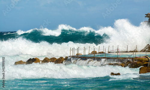 Swimming pool by the sea, Bronte Beach, Sydney Australia photo