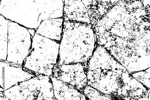 Distressed overlay texture of rough surface, dry soil, cracked ground. Grunge background. One color graphic resource.