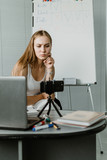 Smart working, agile, remotely working, Flexible hours, rearranged offices, new way of organising work. Young woman, company employee communicates with colleagues remotely