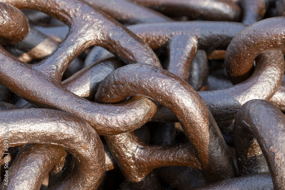 Interlocking links in a very large metal iron chain - close up detail ...